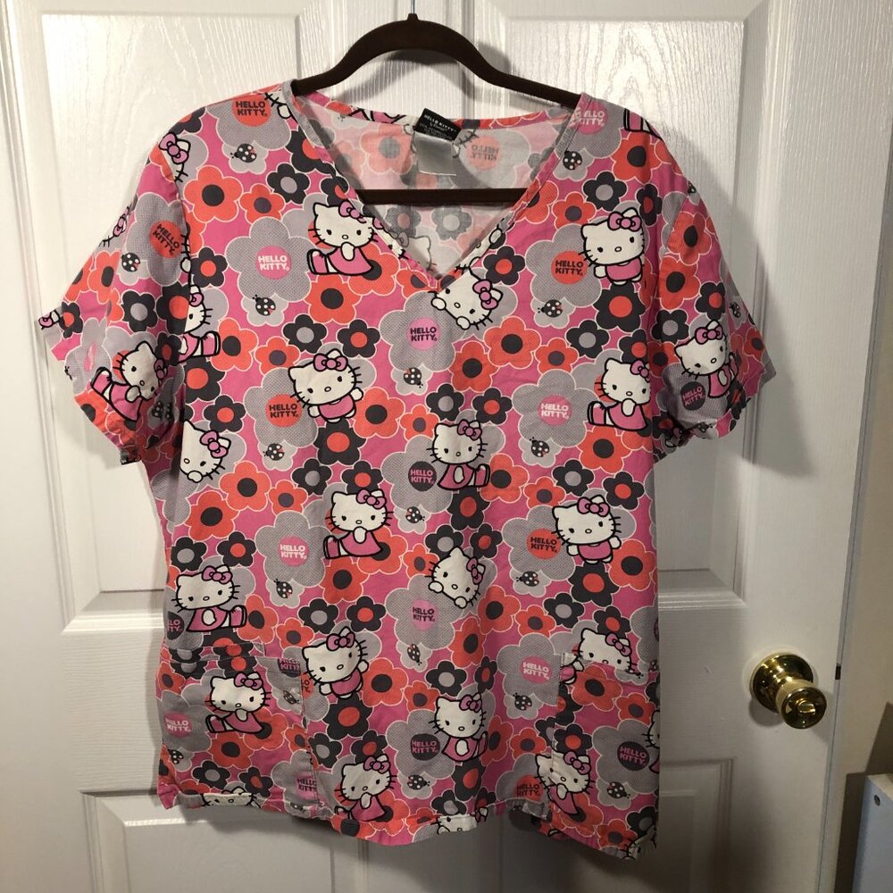 Hello Kitty women pink and orange scrub top, size XL